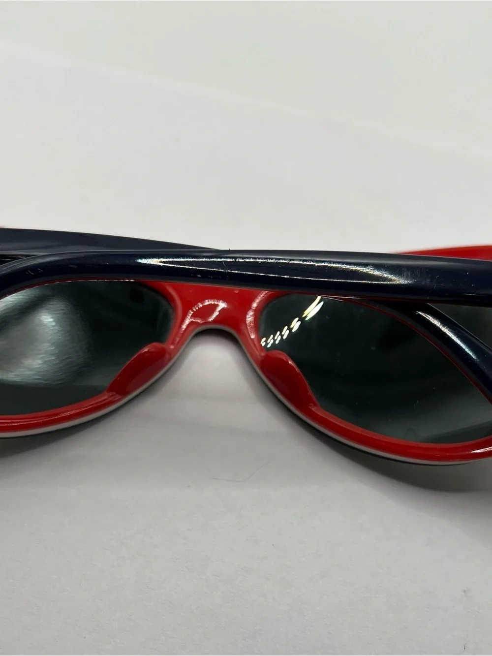 Navy Blue and Red Ski Sunglasses with Dark Lenses